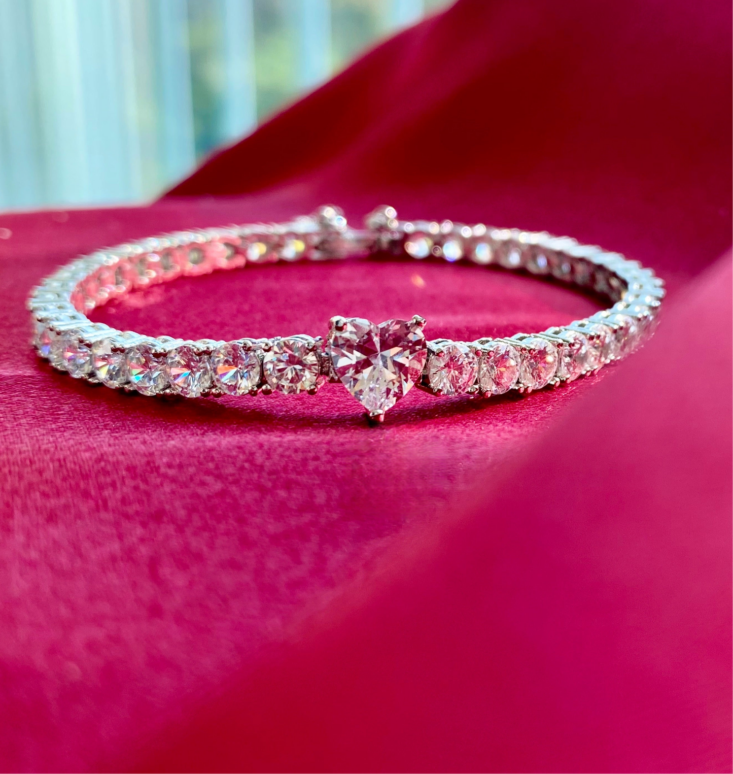 Heart cut diamond tennis bracelet