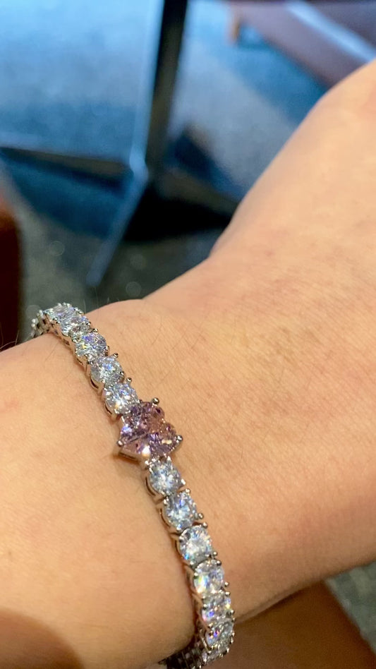 Pink diamond heart cut tennis bracelet