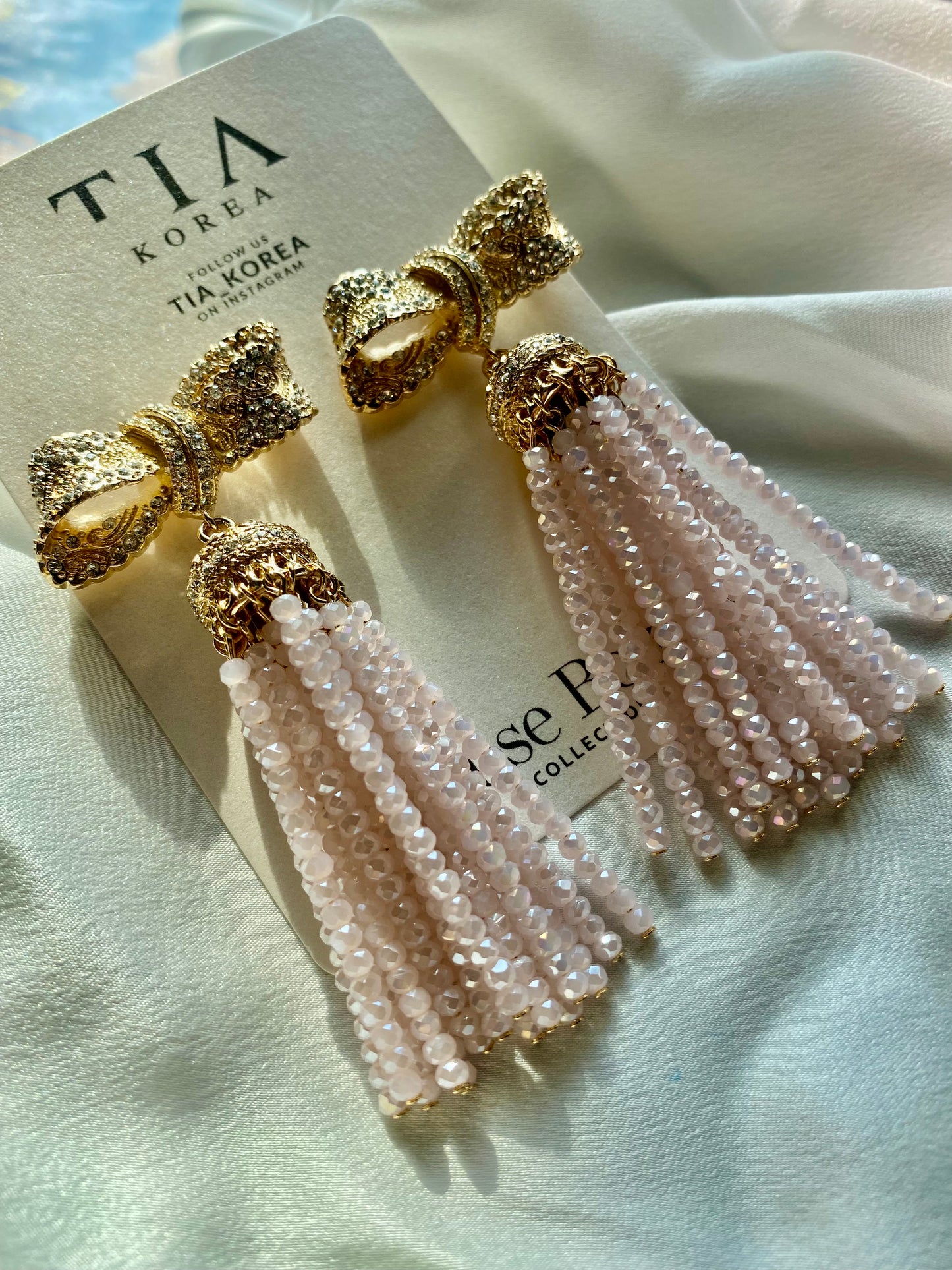 Crystal tessellated earrings in pink gold ribbon